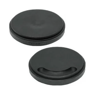 Deux coussins d’emboîtage ronds en caoutchouc noir.